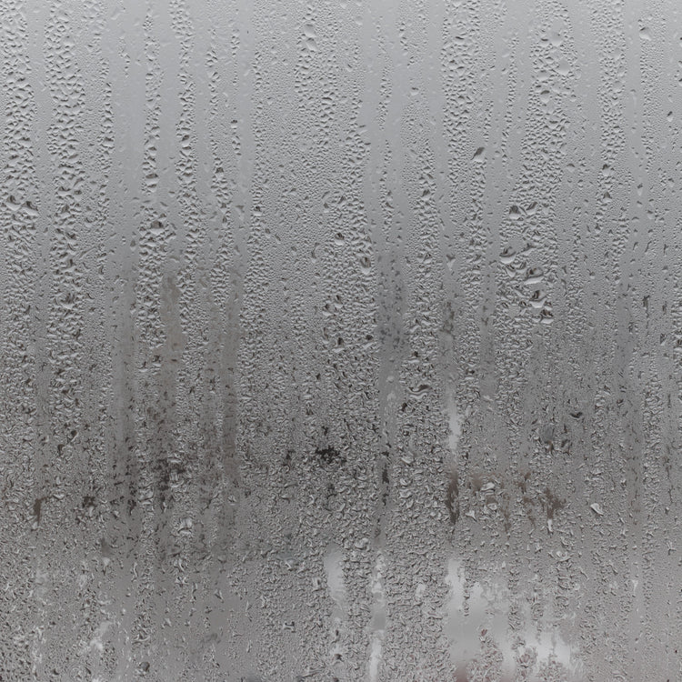 steamed shower glass with water droplets 