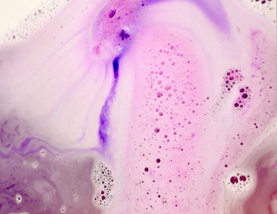 purple and pink foam with bath bubbles from lavender bath bomb 